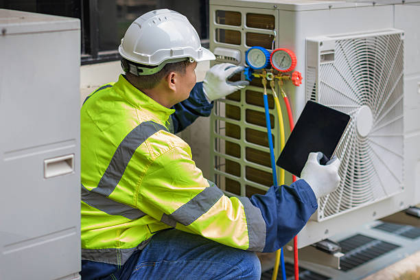 Professional Heat Pump Repair technician working in Auburn, IN